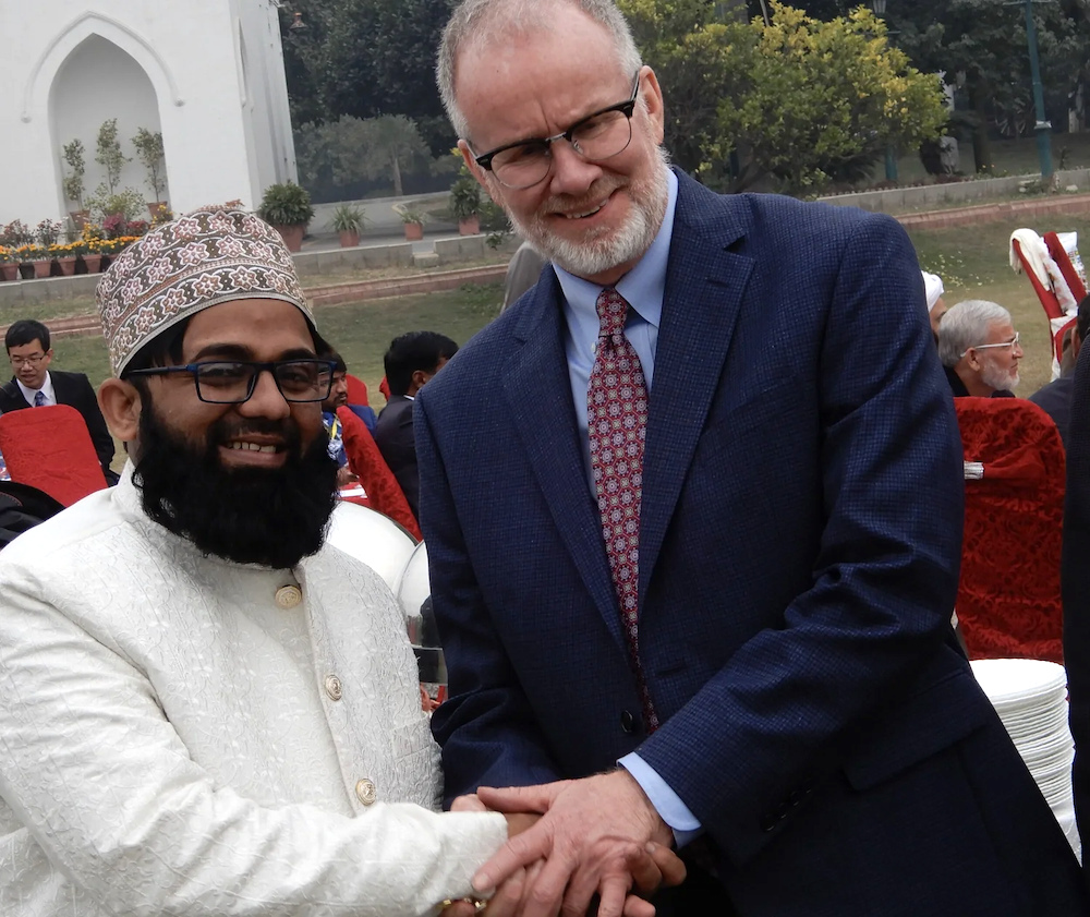 J.P. Knight greeting a friend in South Asia